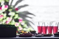 Colorful birthday party table with drinks and snacks in soft sunlight Royalty Free Stock Photo