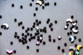 Colorful, black beads and stones isolated on grey background