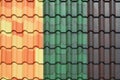 Colorful black Green Orange Yellow corrugated metal roof sheets or metal sheet background Royalty Free Stock Photo