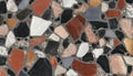 Colorful Black Terrazzo Texture with Rustic Stone Aggregate and Unique Rock Fragments on Surface Royalty Free Stock Photo