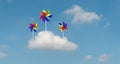 Colorful blades turbines on white cloud, paper rainbow windmill illustration