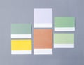 The Colorful blank notes adhesives paper for your text or message on grey background Royalty Free Stock Photo
