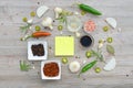 Colorful blank stickers for notes and pepper, bay leaf, rosemary, onions, Himalayan salt, olive oil, soy sauce on Royalty Free Stock Photo