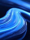 Colorful Blue Fluid Forms Wave Patterns on a Dark Surface Showcasing Smooth Texture and Vibrant Hues Royalty Free Stock Photo