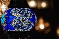 Colorful blue Moroccan lamp with blue glass mosaic design. Oriental style