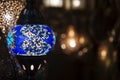 Colorful blue Moroccan lamp with blue glass mosaic design. Oriental style