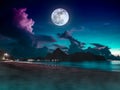 Colorful blue sky with cloud and bright full moon on seascape to night Royalty Free Stock Photo