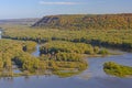 Colorful bluffs above a river confluence in Fall Royalty Free Stock Photo