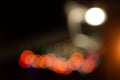 Colorful blurry lights. Yellow, blue, red. garland in blur. Night. Black background