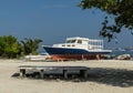 Colorful boat on the beach of tropical island, Maafushi beach, Maldives, Indian Ocean Royalty Free Stock Photo
