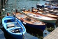 Colorful small boats and ducks in touristic port of Sulzano, Italy Royalty Free Stock Photo