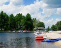 Colorful boats on a lake in Maine Royalty Free Stock Photo