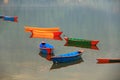 Colorful boats and their reflections on phewa lake Royalty Free Stock Photo