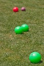 Colorful Bocce Balls in Green Grass Royalty Free Stock Photo