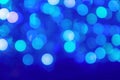 Colorful bokeh abstract on blue background created by neon lights in night time Royalty Free Stock Photo