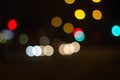 Colorful bokeh effect of city lights at night creating a beautiful abstract background Royalty Free Stock Photo