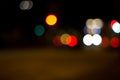 Colorful bokeh effect of city lights at night creating a beautiful abstract background Royalty Free Stock Photo