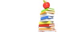 Colorful books stack apple education white background Royalty Free Stock Photo