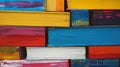 Colorful books stacked texture background