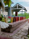 Colorful bottles decorate a tomb