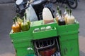 Colorful bottles of juices and sauces sold on the back of the motorbike, Java, Indonesia