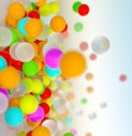 Colorful bouncing balls outdoors against blue sunny sky Royalty Free Stock Photo
