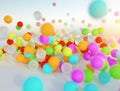 Colorful bouncing balls outdoors against blue sunny sky Royalty Free Stock Photo