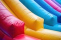 Colorful bouncy castle slide for children playground. Generative AI. Royalty Free Stock Photo