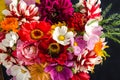 Colorful bouquet of garden flowers close-up on a black background Royalty Free Stock Photo