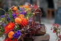Colorful bouquets of autumn flowers on defocused background with copy space for text