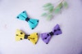 Colorful bow tie on white background, vintage style, selective focus