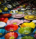 colorful bowls, plates and cup in morning market