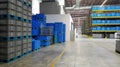 The colorful boxes (blue) stocked in the warehouse Royalty Free Stock Photo