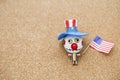 Colorful bozo wooden ghost with American flag