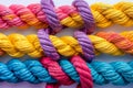 Colorful braided ropes on white background symbolizing unity, diversity, and teamwork Royalty Free Stock Photo