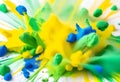 colorful brazilian flag green yellow blue color holi paint powder explosion on isolated white Royalty Free Stock Photo