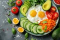 A colorful breakfast platter with fried eggs, fresh vegetables, and avocado slices