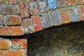 A colorful brick pattern on old derelict fireplace Royalty Free Stock Photo