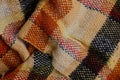 Colored bright texture with a pattern of woolen fabric scarf Royalty Free Stock Photo