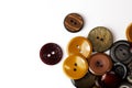 Colorful bright brown, beige and ochre buttons background. Old vintage buttons close-up. Copy space. Top view. Background of Royalty Free Stock Photo