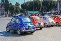 Colorful bright group of  Italian small classic vintage subcompact cars Fiat 500  parked  on one of famous square of Rome Royalty Free Stock Photo