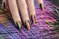 Colorful bright manicure with different sharp shape of nails framed with black lacquer.Nail art. Royalty Free Stock Photo
