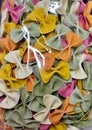 Colorful bright pasta in the form of bows close-up Royalty Free Stock Photo