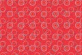 Colorful bright pattern of white beaded circles over red background with bokeh effect Royalty Free Stock Photo