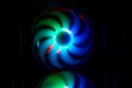 Colorful bright rainbow led rgb pc fan air case cooler. Computer chassis. Gaming modding, technology concept and IT background