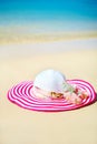 Colorful bright sunhat on the beach sand Royalty Free Stock Photo
