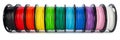 Colorful bright wide panorama row of spool 3d printer filament Royalty Free Stock Photo