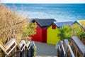 Colorful Brighton Beach huts against blue sea. Royalty Free Stock Photo