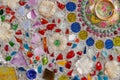 the colorful broken tile, bead, bowl and stone decorating on temple wall