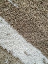 Colorful brown and white abstract wool and cotton textile pattern as warm carpet rug with texture soft to touch